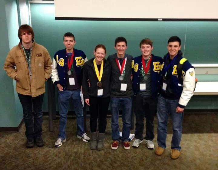 Tim Macon, 12, Shea Targgart, 12, Sydney Rodenbeck, 12, Caleb Larson, 11, Jayson Arend, 12, and Aaron Dills, 12, pose after the awards ceremony at the Science Olympiad Saturday.
