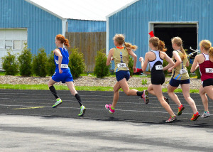 Alexia Zawadske takes an early lead in the John Reed Mile, in which she was victorious.