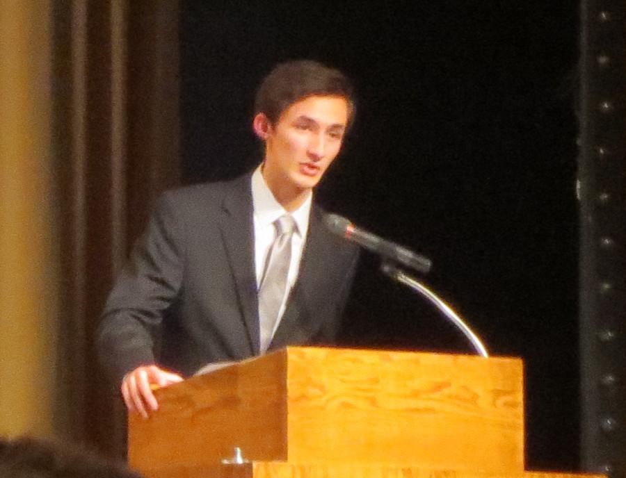Caleb+Larson%2C+NHS+President%2C+speaks+of+character+at+the+ceremony.+