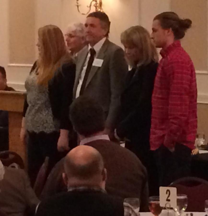 Keith Hoffar, center, is recognized at the Hall of Fame banquet.