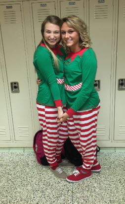 Senior Jordan Axel and junior Rachel Ort matching in elf pajamas this Wednesday. 